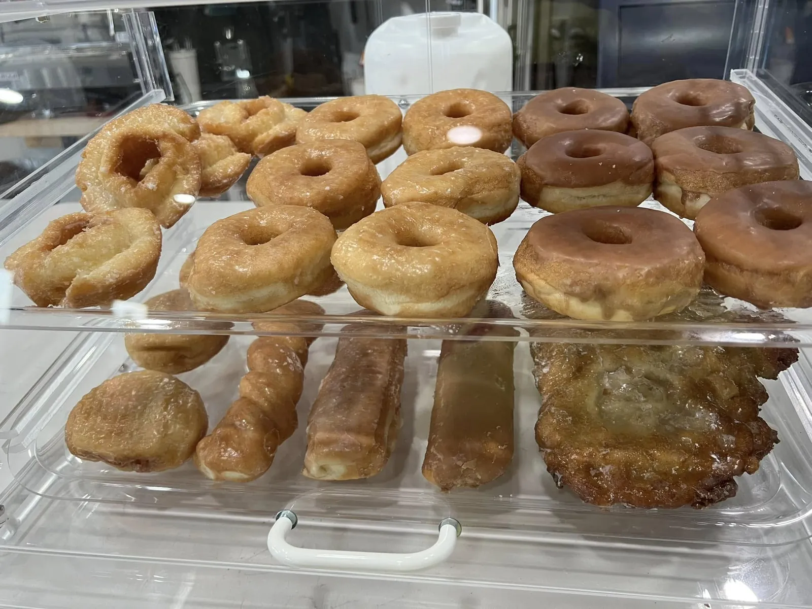 Trays of fresh pastries and cinnamon rolls from Java Don's, ready for catering in Afton, OK